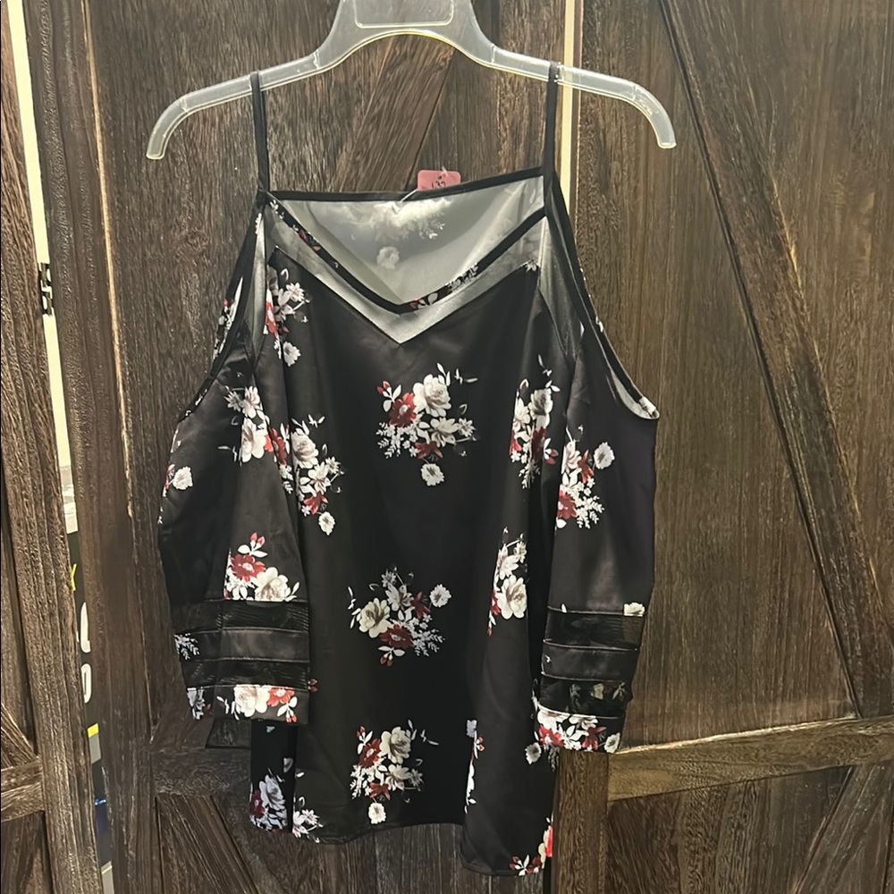 Floral Black Cold Shoulder Top.  Super cute on. Pair with white/black pants.